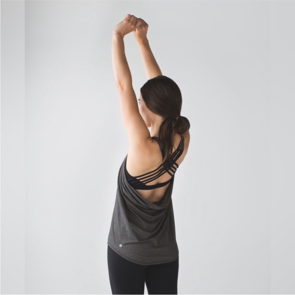 Lulu lemon top with built in bra, size 4. Really cute on and never worn!